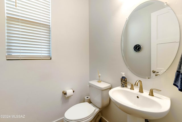 bathroom with sink and toilet