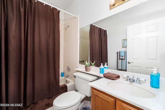 full bathroom featuring toilet, vanity, and shower / tub combo