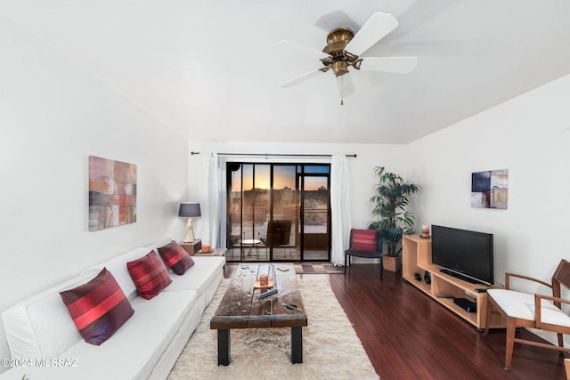 living room featuring ceiling fan and wood-type flooring