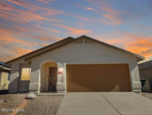 view of front of property featuring a garage