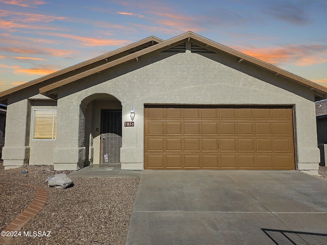 view of front of house with a garage