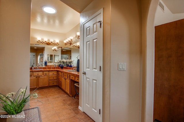 bathroom featuring vanity and tile patterned floors