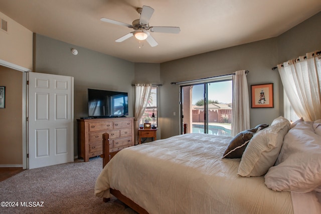 bedroom with carpet flooring, access to exterior, and ceiling fan