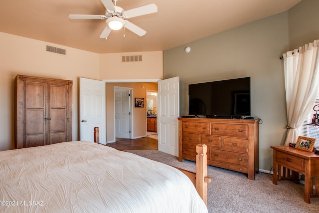 carpeted bedroom featuring ceiling fan