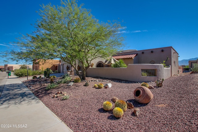 view of property exterior featuring a garage