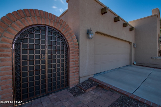 exterior space with a garage