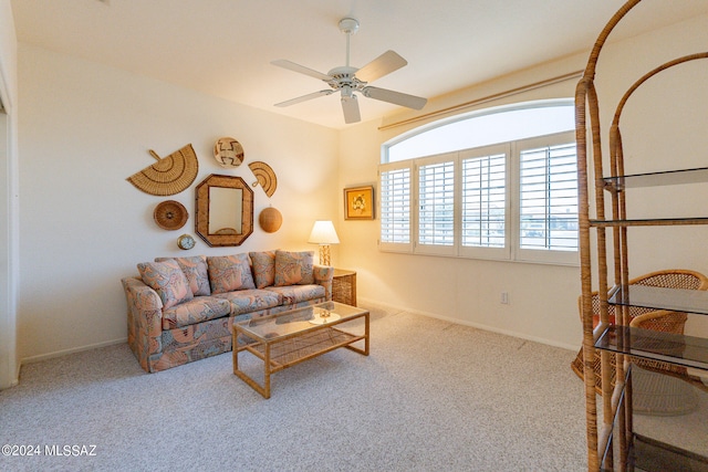 living room with carpet flooring and ceiling fan