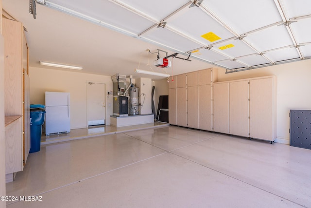 garage featuring a garage door opener, gas water heater, and white refrigerator