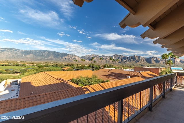 balcony featuring a mountain view