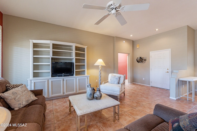 tiled living room with ceiling fan