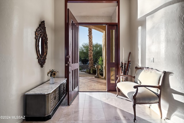 entrance foyer with light tile patterned flooring