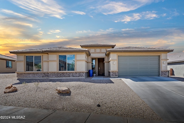 prairie-style house with a garage