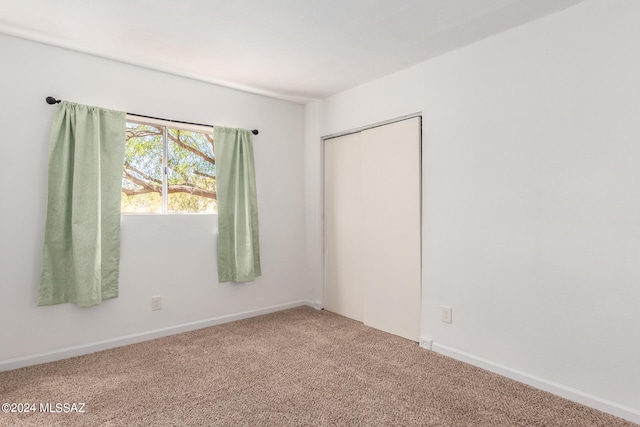 spare room with carpet flooring