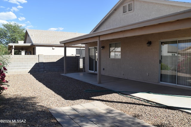 rear view of property with a patio