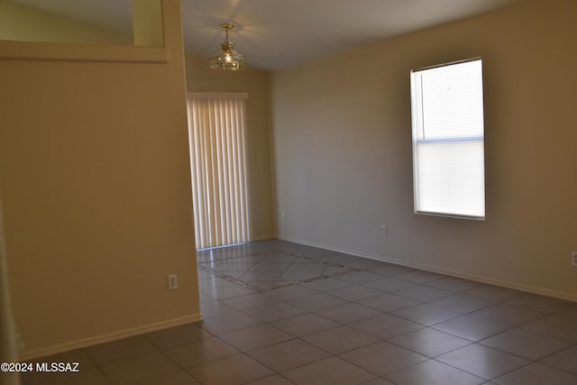 view of tiled spare room