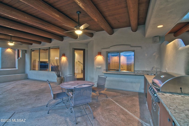 view of patio / terrace with ceiling fan