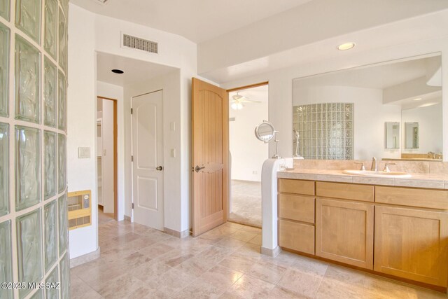 bathroom with vanity and ceiling fan