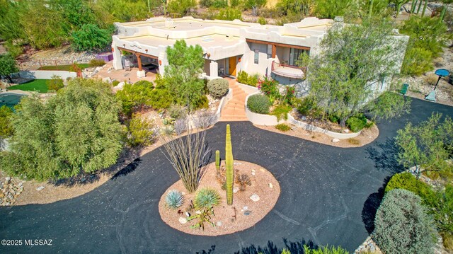 view of property exterior with a garage