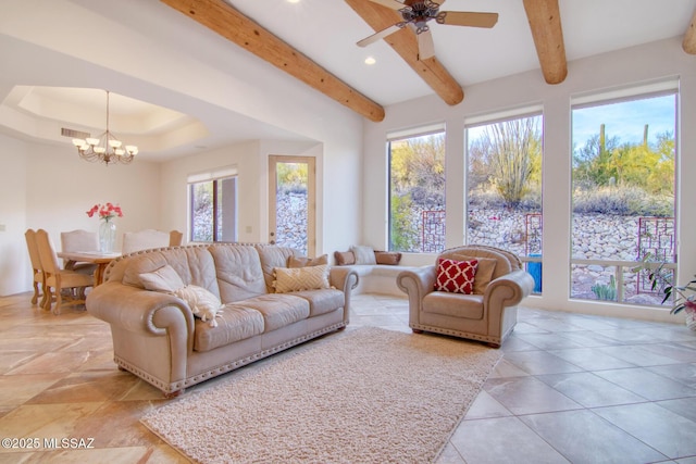 living room featuring ceiling fan and beam ceiling