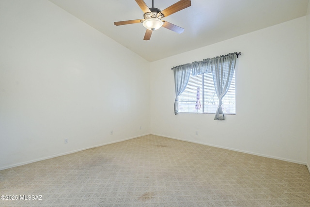 1888 Circulo Guatemala, Rio Rico, AZ 85648 - unfurnished room featuring lofted ceiling, ceiling fan, light carpet, and baseboards
