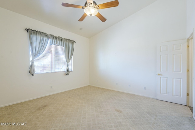 1888 Circulo Guatemala, Rio Rico, AZ 85648 - empty room with lofted ceiling, light colored carpet, a ceiling fan, and baseboards