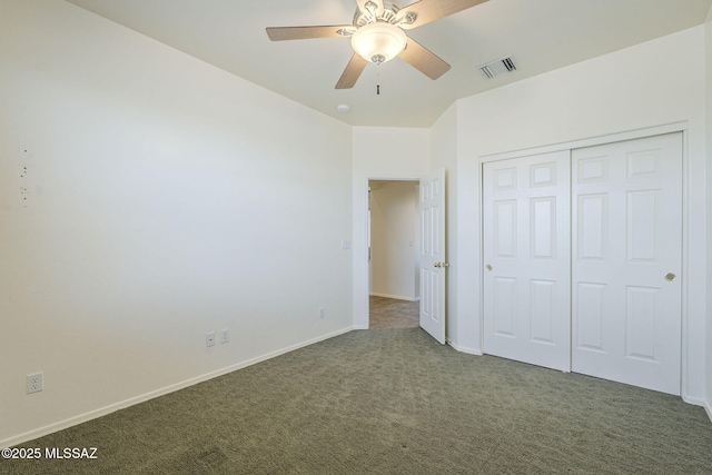 1888 Circulo Guatemala, Rio Rico, AZ 85648 - unfurnished bedroom featuring carpet flooring, baseboards, a closet, and ceiling fan