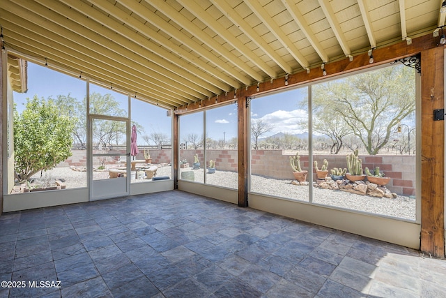 1888 Circulo Guatemala, Rio Rico, AZ 85648 - unfurnished sunroom with vaulted ceiling and a mountain view