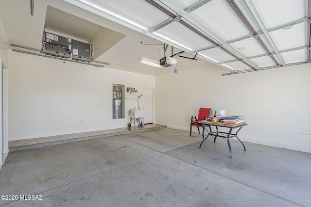 1888 Circulo Guatemala, Rio Rico, AZ 85648 - garage featuring a garage door opener and electric water heater