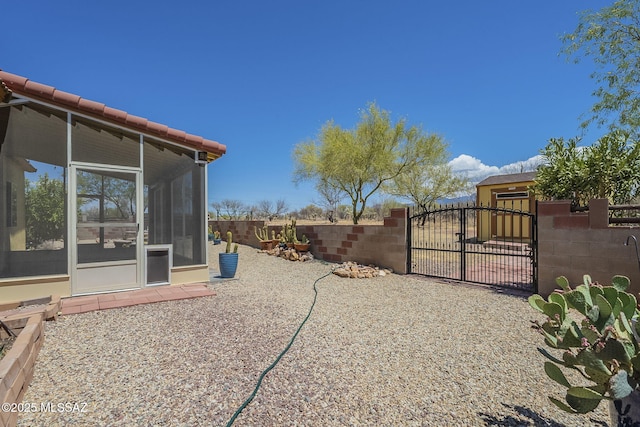 1888 Circulo Guatemala, Rio Rico, AZ 85648 - fenced yard with a sunroom and a gate
