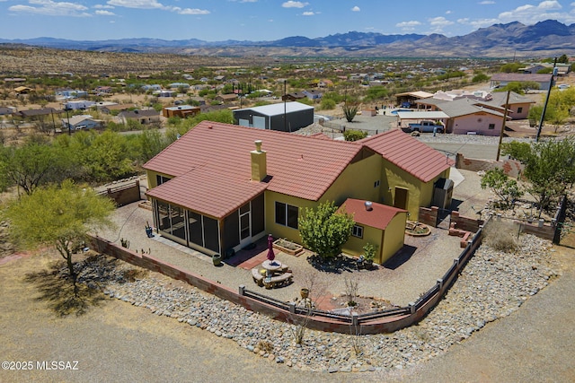 1888 Circulo Guatemala, Rio Rico, AZ 85648 - aerial perspective of suburban area with a mountain backdrop