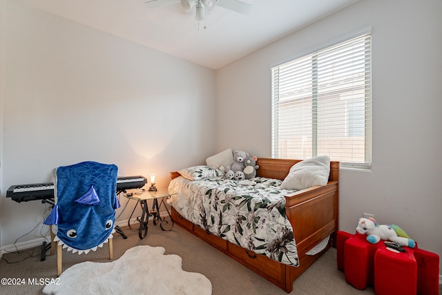 carpeted bedroom with ceiling fan