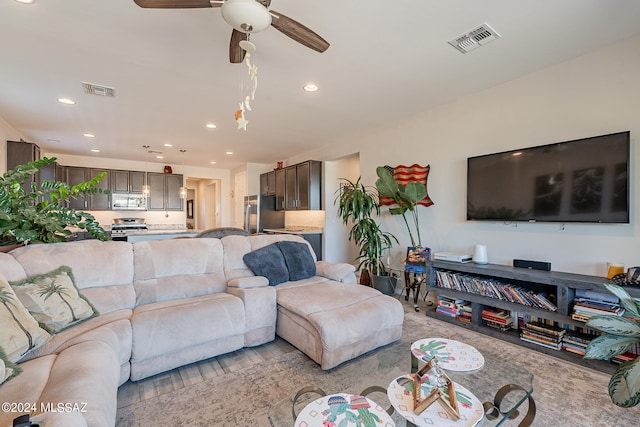 living room with ceiling fan