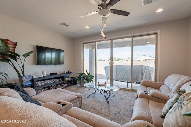 living room with ceiling fan