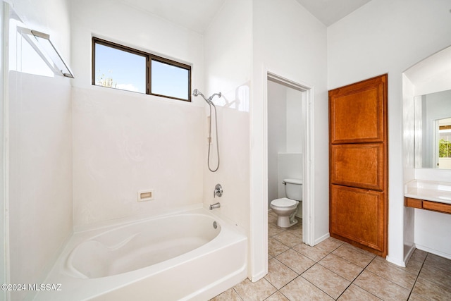 full bathroom with vanity, shower / tub combination, toilet, and tile patterned floors