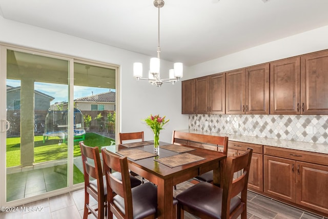 dining area with a chandelier