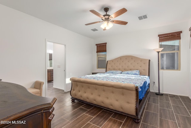 bedroom featuring ensuite bathroom and ceiling fan