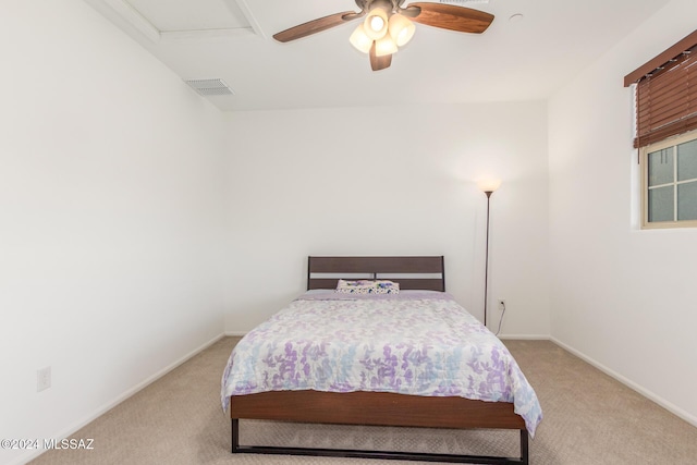 carpeted bedroom with ceiling fan