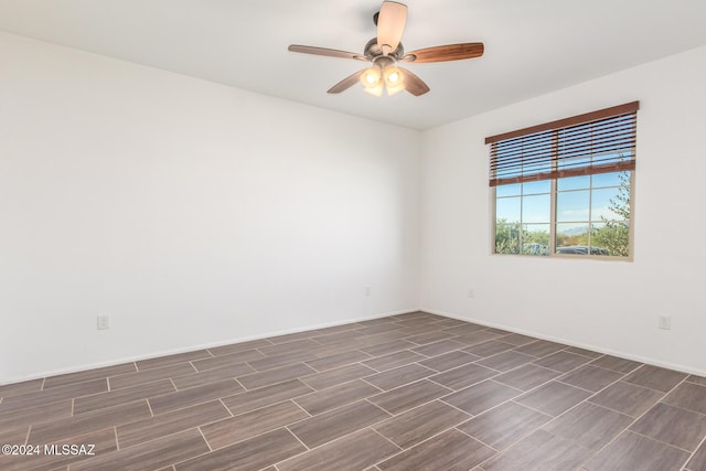 unfurnished room featuring ceiling fan