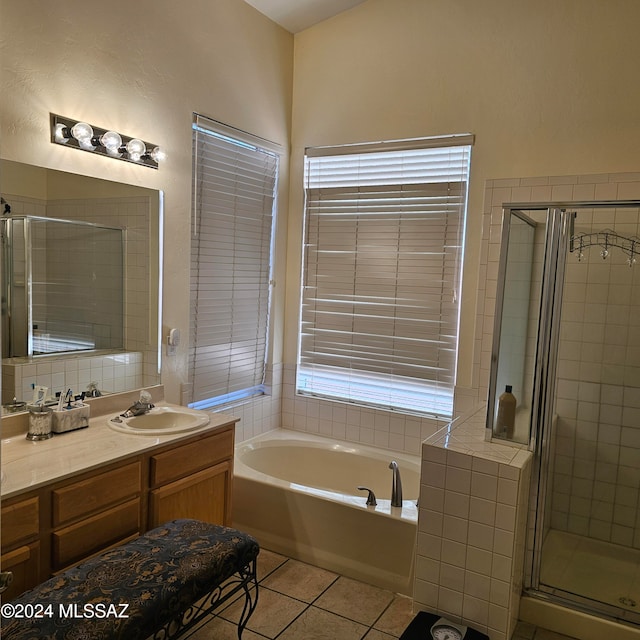 bathroom with vanity, separate shower and tub, and tile patterned flooring