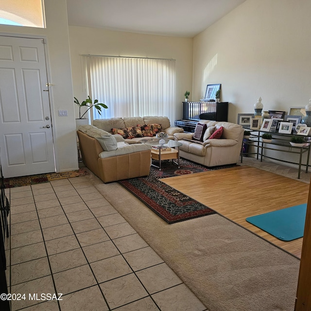 living room with tile patterned flooring