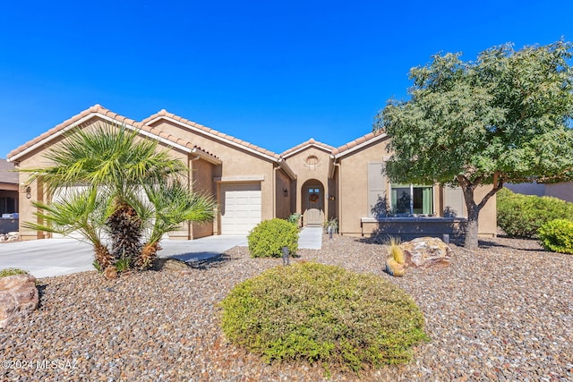 view of front of home with a garage