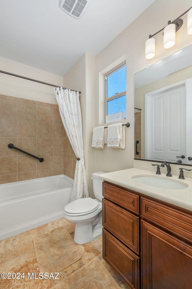 full bathroom with shower / bath combination with curtain, vanity, and toilet