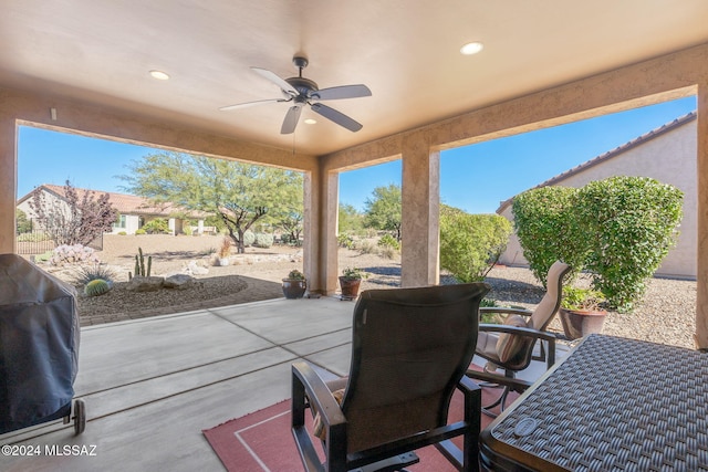 view of patio featuring a grill and ceiling fan