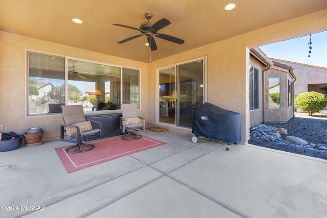 view of patio / terrace featuring area for grilling and ceiling fan