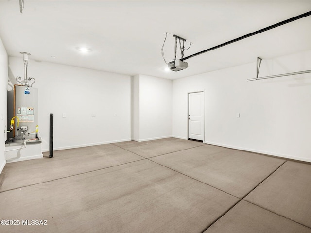 garage with baseboards, a garage door opener, and gas water heater