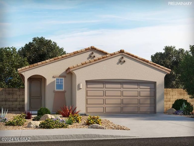 view of front of property with a garage