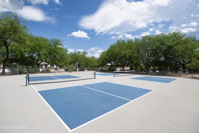 view of tennis court with basketball court