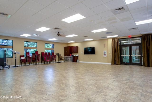 misc room with a paneled ceiling