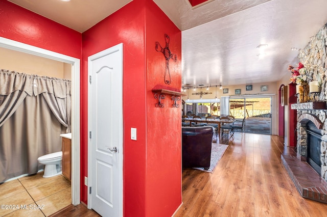 corridor featuring hardwood / wood-style flooring