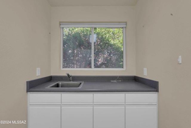 kitchen with white cabinets and sink